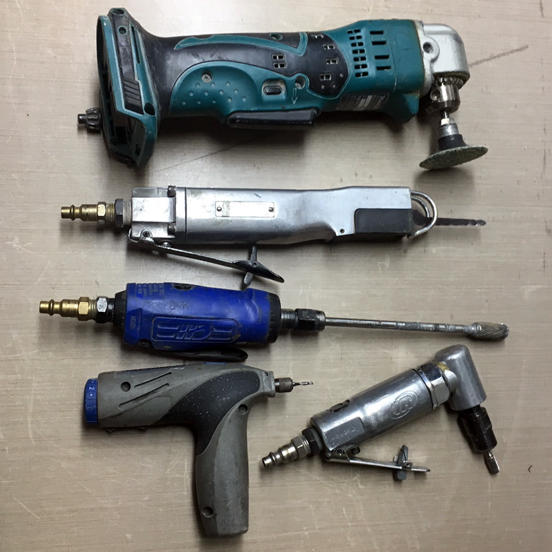 small trimming and grinding tools for composites: Makita right angle drill, reciprocating saw, die grinder, Dremel and right angle die grinder 